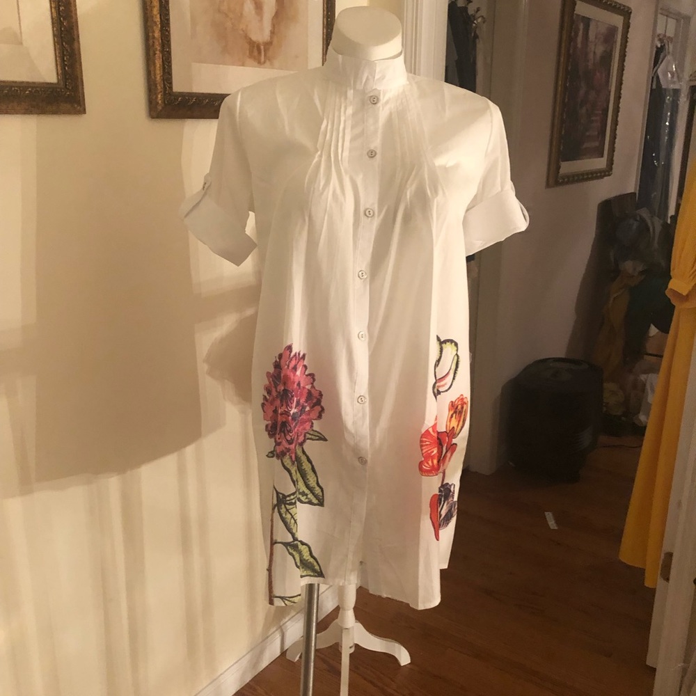 White blouse with floral detail